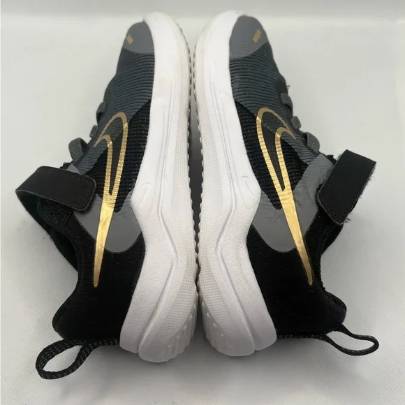 Nike Kids Black and Gold Sneakers - Picture 1 of 9